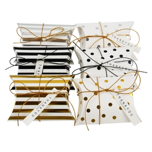 European pillow-shaped gift boxes with gold foil stripes and dots for wedding favors