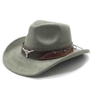 Detail of western cowboy hat featuring leather band with metallic bull head and studs