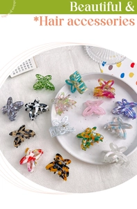 Detail showing various acetate butterfly hair claws in marble and tortoiseshell patterns