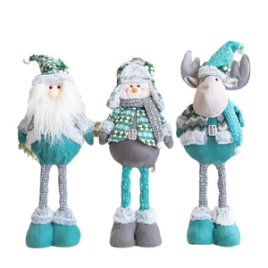 Three Christmas telescopic dolls featuring Santa, Snowman, and Reindeer in green and grey