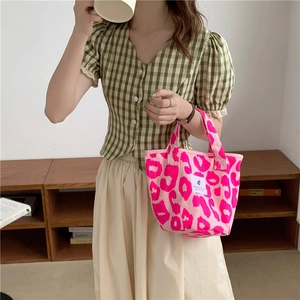 Pink leopard print canvas tote bag with shoulder straps for women and students