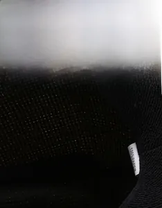 Detail of western straw hat interior showing 100% paper material and sweatband