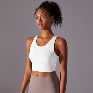 Close-up of white sports bra with wide straps and wide hem for medium support