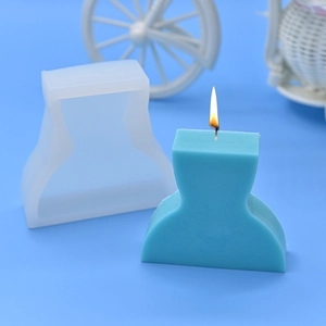 Silicone mold for portrait silhouette candles with blue wax sample on light background