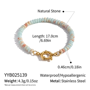 Macro view of a 17cm natural stone beaded bracelet with gold stainless steel spring clasp