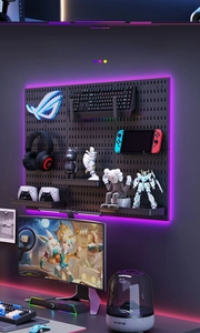 Detail of black modular pegboard with RGB lighting for gaming room storage and decor