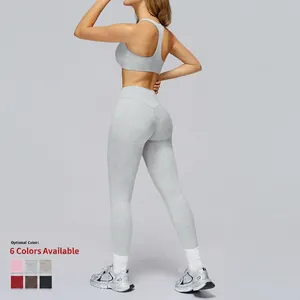 Women's brushed grey yoga set featuring racerback sports bra and high-waisted leggings