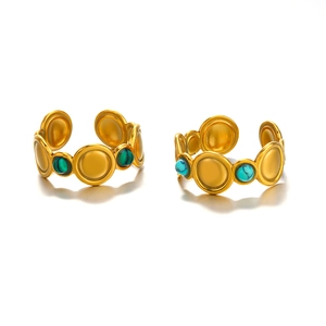 Gold stainless steel rings with green malachite and blue turquoise circular inlays