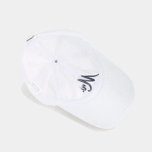Detail shot of the white cotton baseball cap showing internal Mr. embroidery and wash label