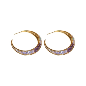 Elegant gold plated crescent moon earrings with purple and white gradient cubic zirconia