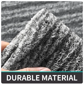 Nahaufnahme der langlebigen PVC-Schlingenmatte mit flexibler grauer Synthetikfaser-Struktur
