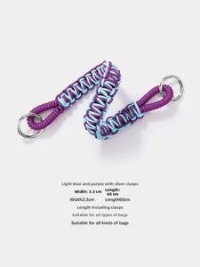 Detail of light blue and purple woven bag strap showing silver metal ring clasps and dimensions