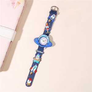 Detail of blue rocket cartoon watch with 3D silicone space patterns for kids