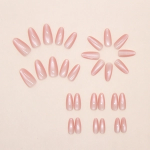 Set mit 24 pfirsichrosa Katzenaugen-Nagelspitzen in Mandelform mit Perlmutt-Effekt