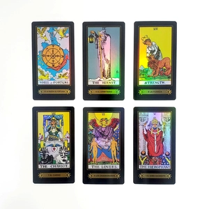 Detail of laser tarot cards with holographic finish and classic Rider Waite imagery