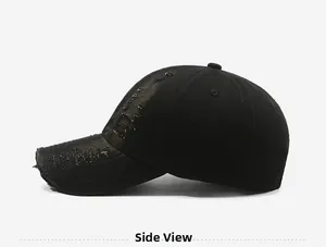 Side view of black distressed baseball cap with vintage frayed brim and cotton canvas detail