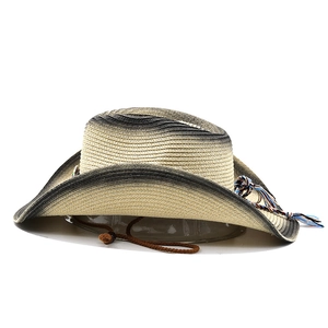 Close-up of bohemian straw cowboy hat featuring gradient brim and braided rope detail
