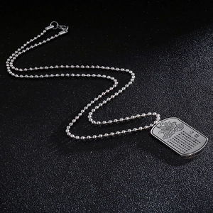Silver lotus lotus and heart sutra engraved rectangle pendant on a beaded chain