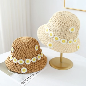 French vintage woven straw bucket hat with daisy embroidery in cream and khaki