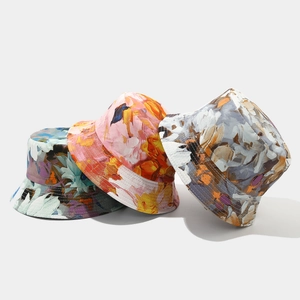 Reversible floral bucket hat with abstract oil painting print for sun protection