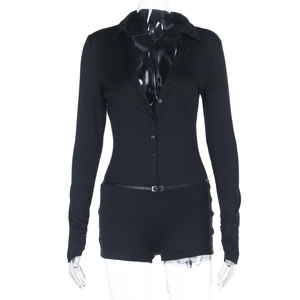 Detail view of black V-neck long sleeve romper with buttons and matching slim waist belt