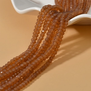 Macro shot of 4mm faceted brown opal glass beads for DIY jewelry making accessories
