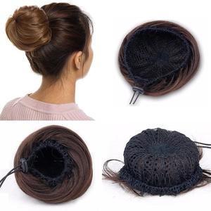 Detail view of brown synthetic bun extension with adjustable drawstring and inner mesh net