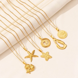 Golden stainless steel ocean collection necklaces with starfish and shell pendants