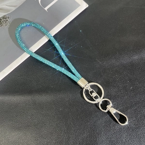 Detail of luxury lake blue rhinestone lanyard with silver ring and lobster clasp