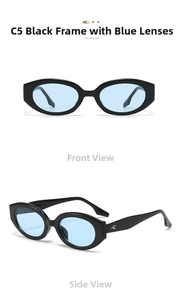 Detail view of oval cat eye sunglasses with black frame, blue lenses, and metal hinge decor
