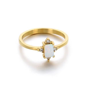 Minimalist gold titanium ring with a rectangular opal and sparkling round zircon accents