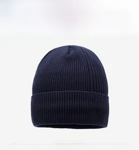 Detailed front view of navy blue rib-knit beanie with professional thermal lining