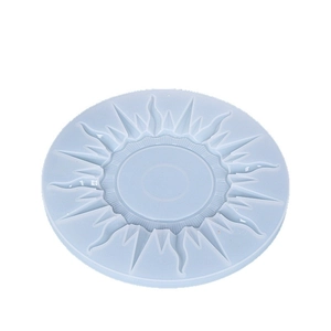 Blue sunburst round silicone mold for resin casting and candle making on white background