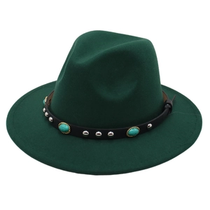 Detail of dark green fedora hat featuring black leather band and turquoise studs