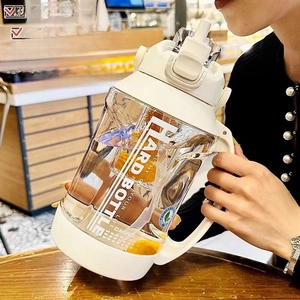 Detail view of large sports water bottle with tea infuser and dual-mode drinking lid