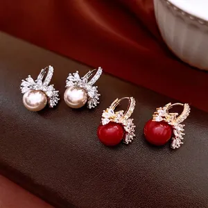 Exquisite 18k gold plated pearl and red bead huggie earrings with sparkling crystals