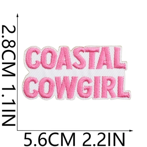 Detailed size view of Coastal Cowgirl embroidered pink patch with white border details