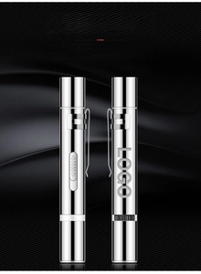 Detail of silver metallic laser pointer pen with stainless steel clip and polished finish