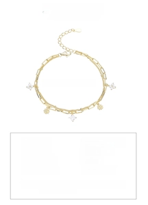 Detail of S925 silver double-layered clover bracelet with gold plating and zircons