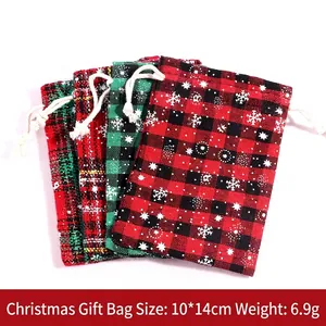 Set of four Christmas plaid drawstring gift bags with snowflake patterns, 10x14cm size