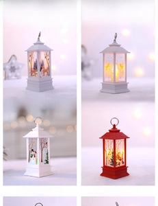 Detailed view of four festive Christmas lanterns with LED lights and holiday motifs