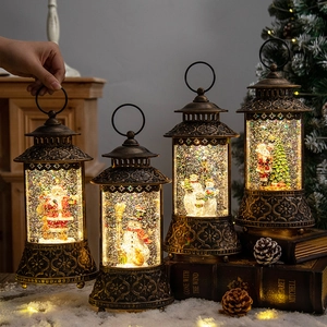 Vintage bronze Christmas lantern with LED light and spinning glitter snow decor
