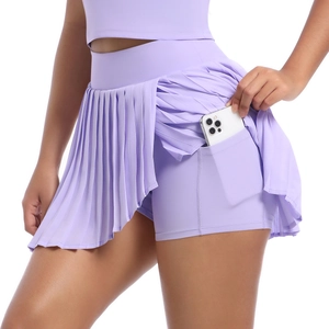 Detail of lavender tennis skirt showing the high waist and functional phone side pocket