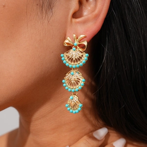 Golden boho fan-shaped bow earrings with turquoise beads and sparkling crystals