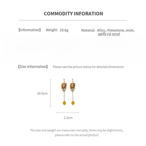 Detailed spec sheet showing 19.6g weight and 10.9cm length for the pearl drop earrings