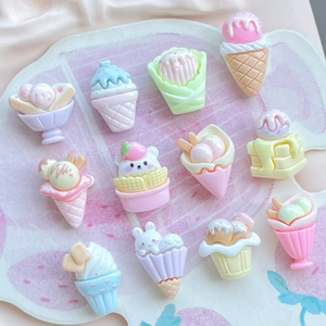 Detailed overhead shot of twelve colorful resin miniature ice cream dollhouse accessories