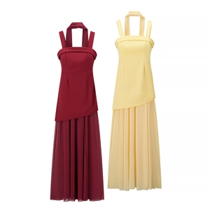 Elegant sleeveless mesh panel maxi dress in burgundy and pale yellow with flowing streamers