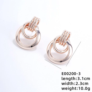 Golden multi-layered circular hoop earrings measuring 3.1cm in length on white background