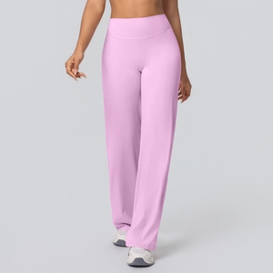 Detail of high-waisted wide-leg yoga pants featuring pink breathable and stretchy fabric