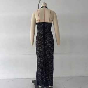Detailed back view of sexy black lace halter dress with backless design on mannequin